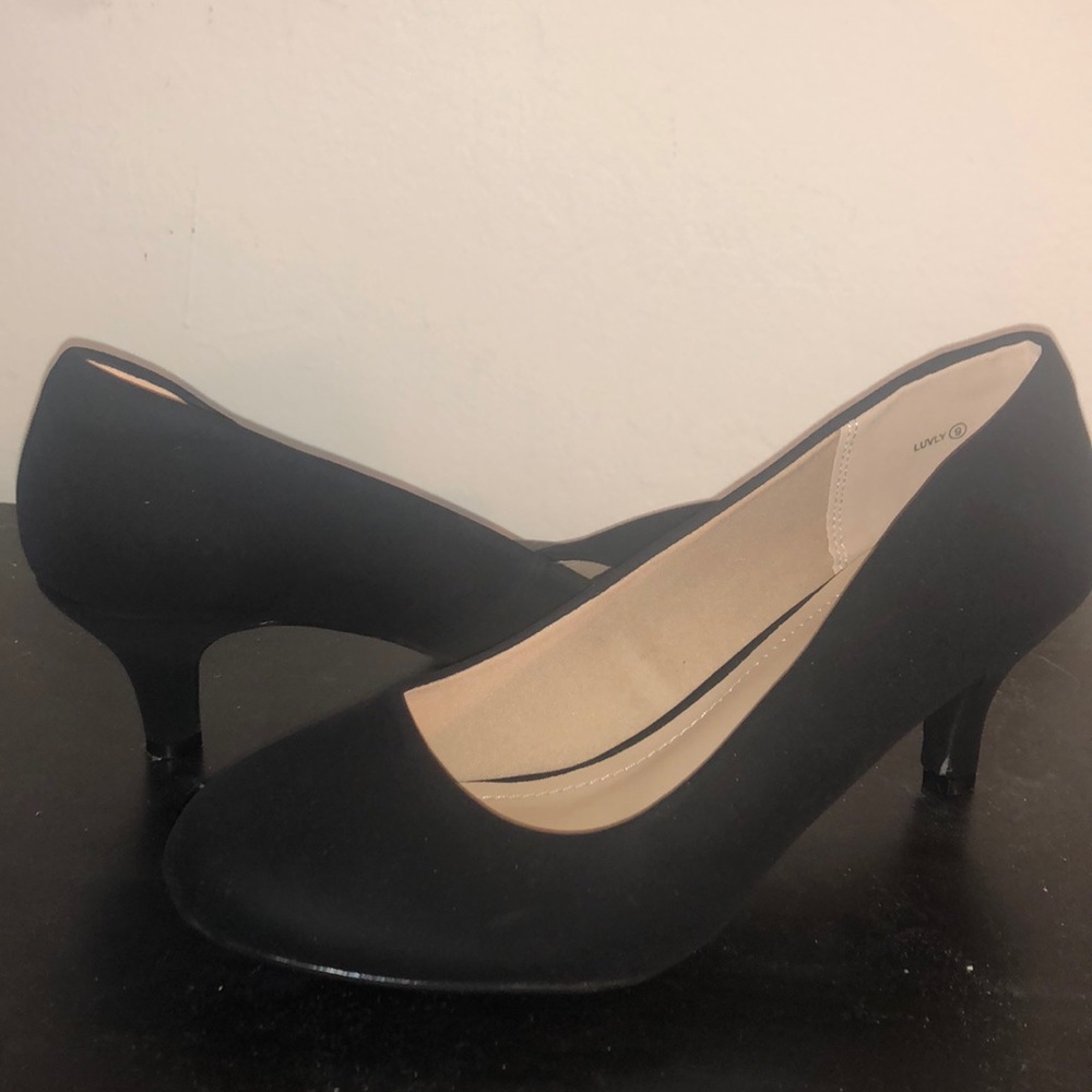 Never worn Black short heel shoe